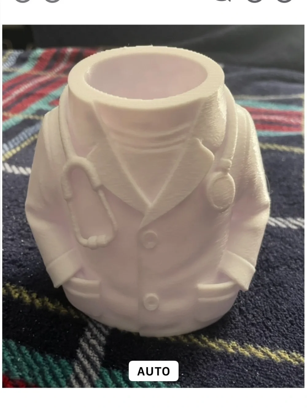 Desktop doctor with white coat and stethoscope molded pencil cup